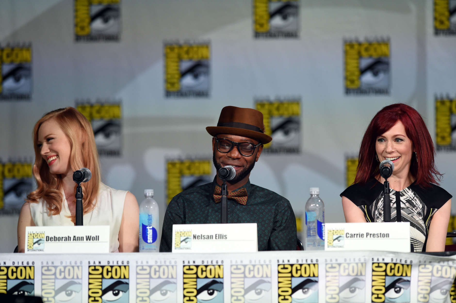SAN DIEGO, CA - JULY 26:  (L-R) Actors Deborah Ann Woll, Nelsan Ellis and Carrie Preston attend HBO's "True Blood" panel during Comic-Con International 2014 at San Diego Convention Center on July 26, 2014 in San Diego, California.  (Photo by Ethan Miller/Getty Images)