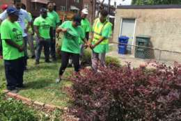 D.C. juvenile offenders in the Grass is Greener program will be mowing the lawns of up to 20 homeowners biweekly across the city — ten from Northeast and Southeast, and ten from Northwest and Southwest. (WTOP/Jenny Glick)