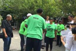 D.C. Mayor Muriel Bowser greets Grass is Greener mentors on Saturday. (WTOP/Jenny Glick) 
