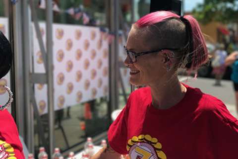 Calif. woman downs 21 burgers, defends title at DC eating contest