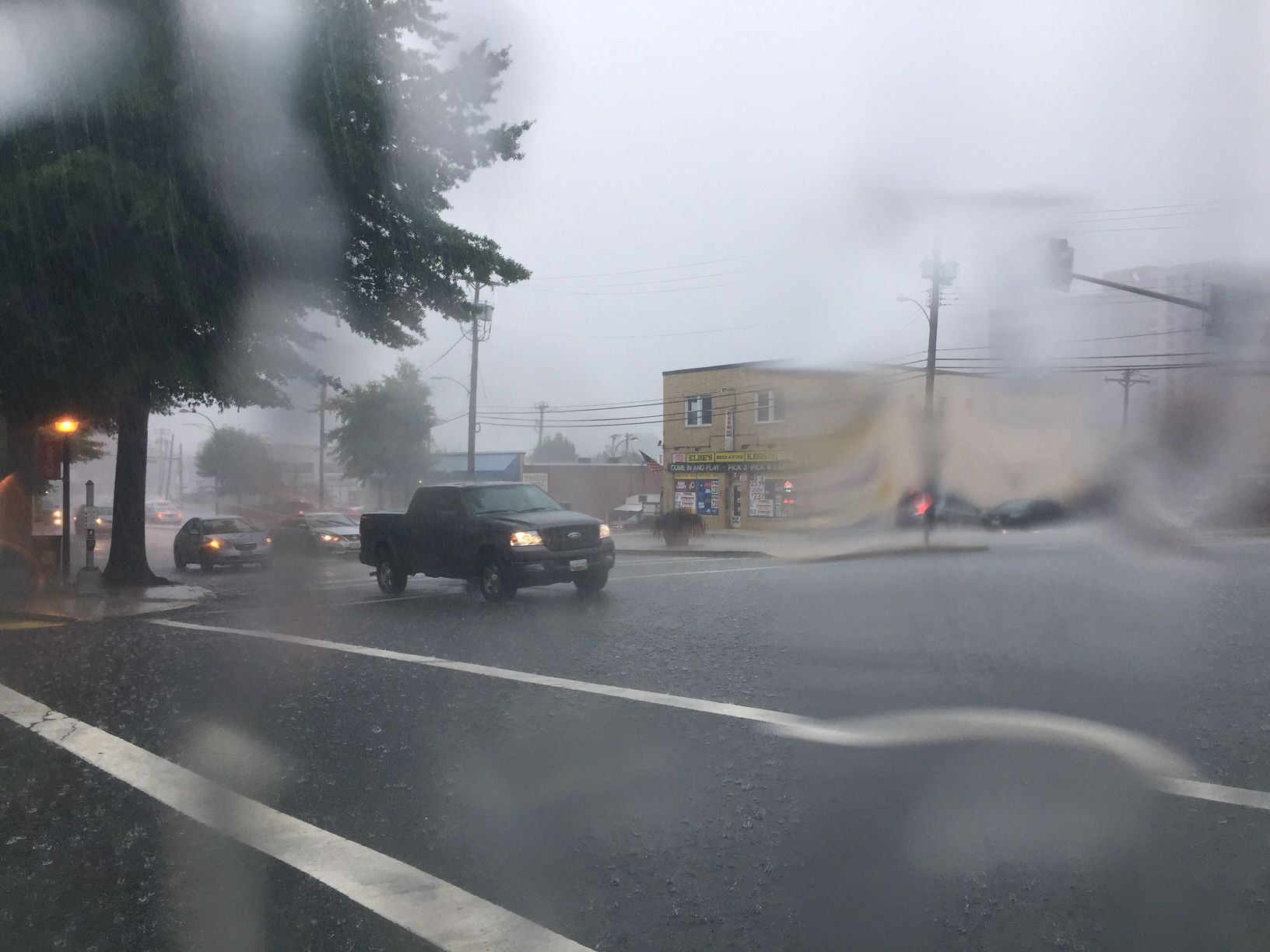 Rain slams drivers in Wheaton, Maryland on Friday. (WTOP/Rich Johnson)