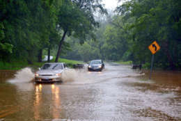 Beach Drive remains under about 6 inches of rain in Kensington, Maryland. (WTOP/Dave Dildine)