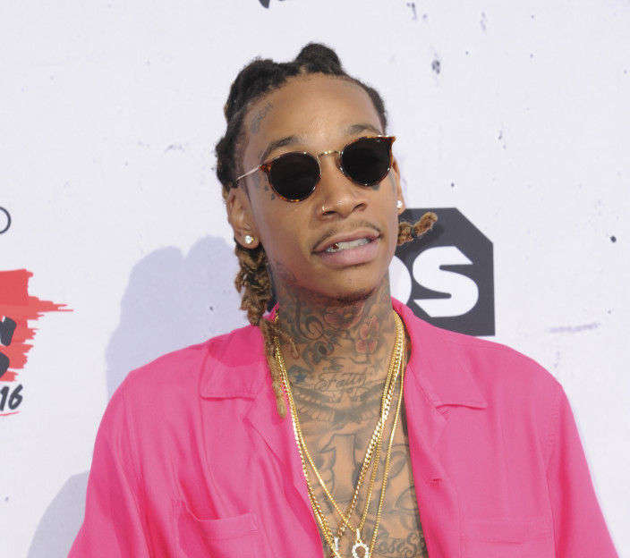 Wiz Khalifa arrives at the iHeartRadio Music Awards at The Forum on Sunday, April 3, 2016, in Inglewood, Calif. (Photo by Richard Shotwell/Invision/AP)
