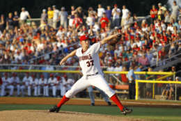 Washington Nationals pitcher Stephen Strasburg, delivers a pitch for the Class-A Potomac Nationals, during  a rehab start in 2011. (AP Photo/Luis M. Alvarez)