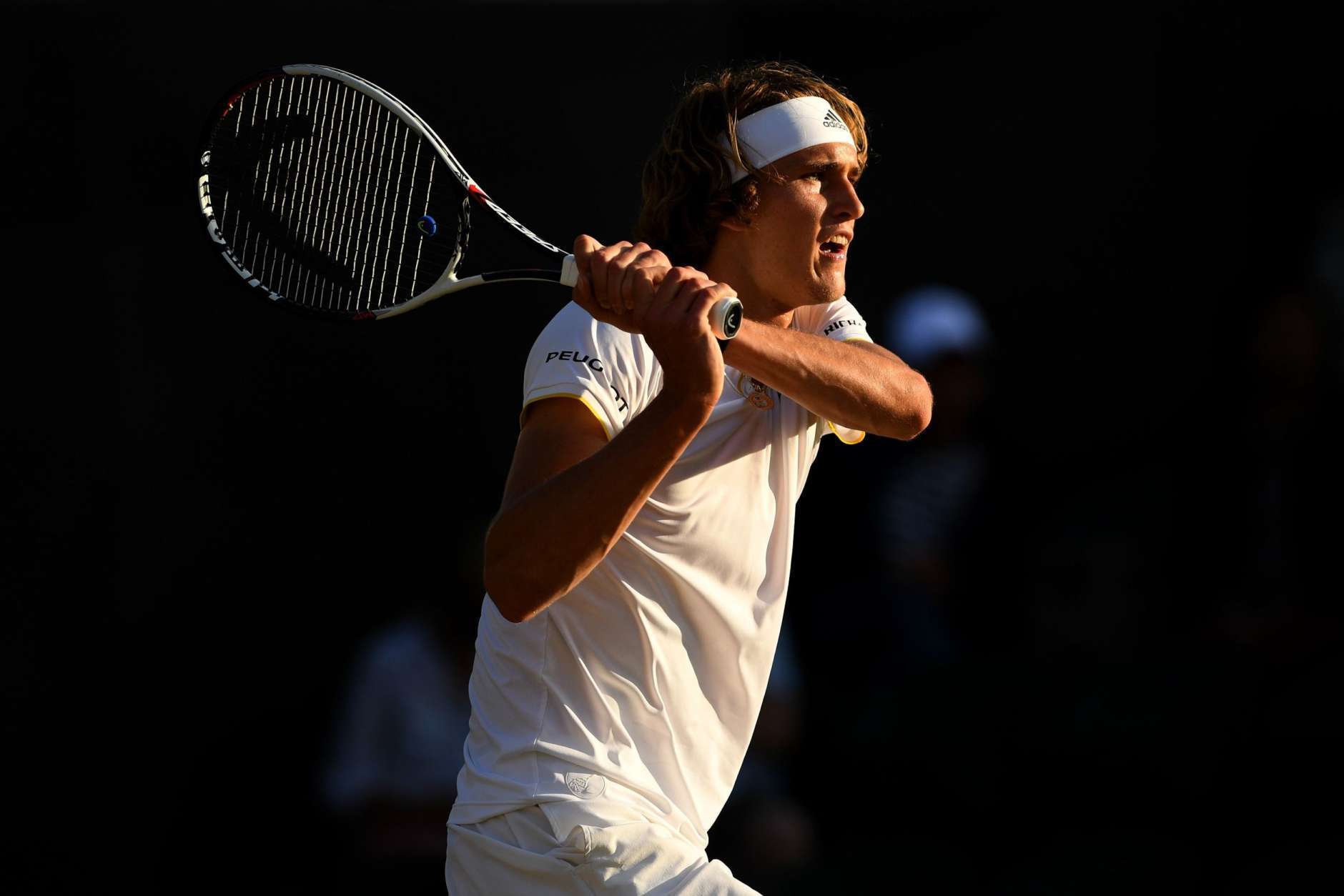 LONDON, ENGLAND - JULY 10:  Alexander Zverev of Germany plays a backhand during the Gentlemen's Singles fourth round match against Milos Raonic of Canada on day seven of the Wimbledon Lawn Tennis Championships at the All England Lawn Tennis and Croquet Club on July 10, 2017 in London, England.  (Photo by Shaun Botterill/Getty Images)
