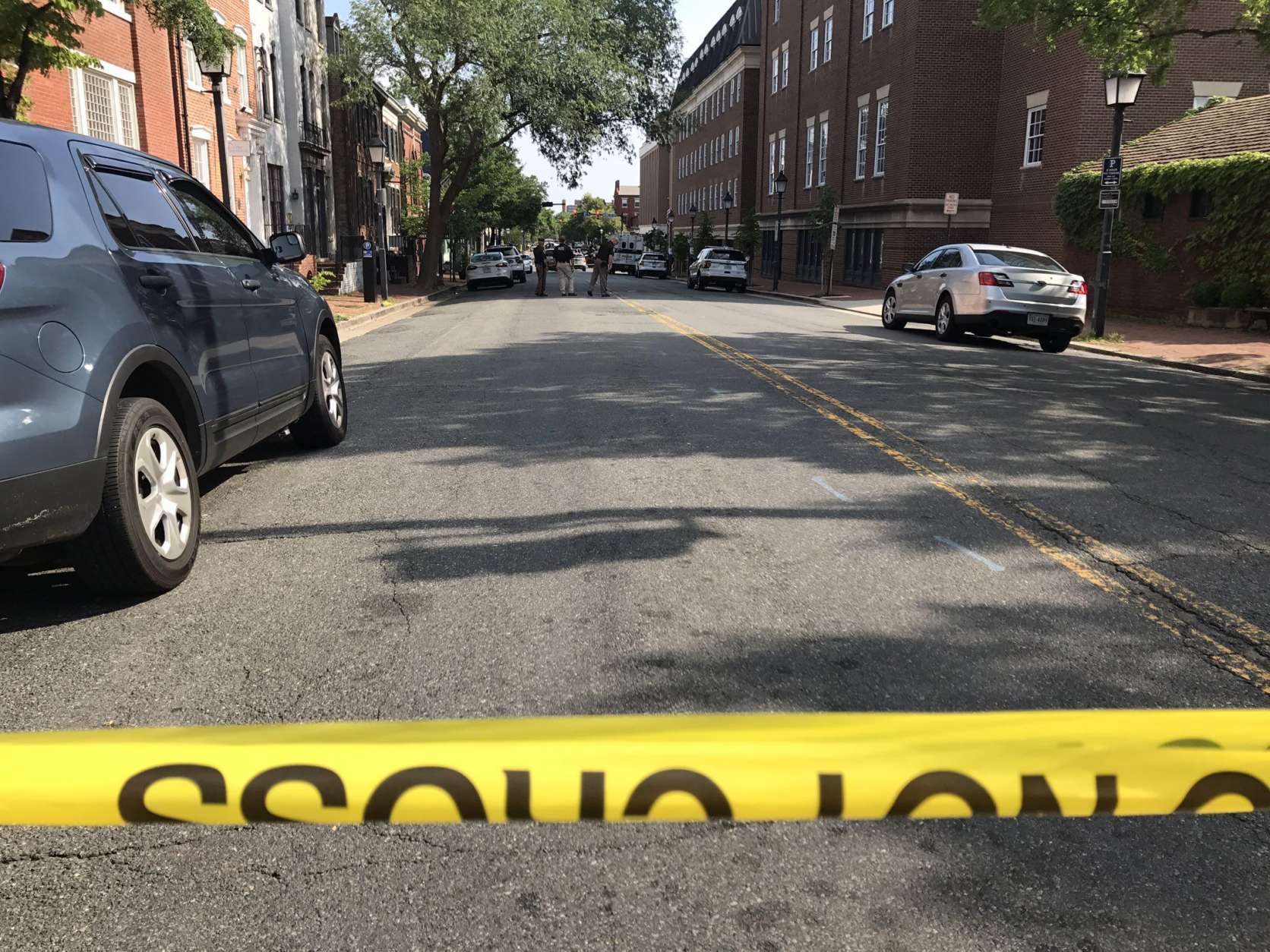 Photo shows crime scene tape over an Alexandria street