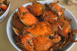 Photo shows a plate of steamed crabs..
