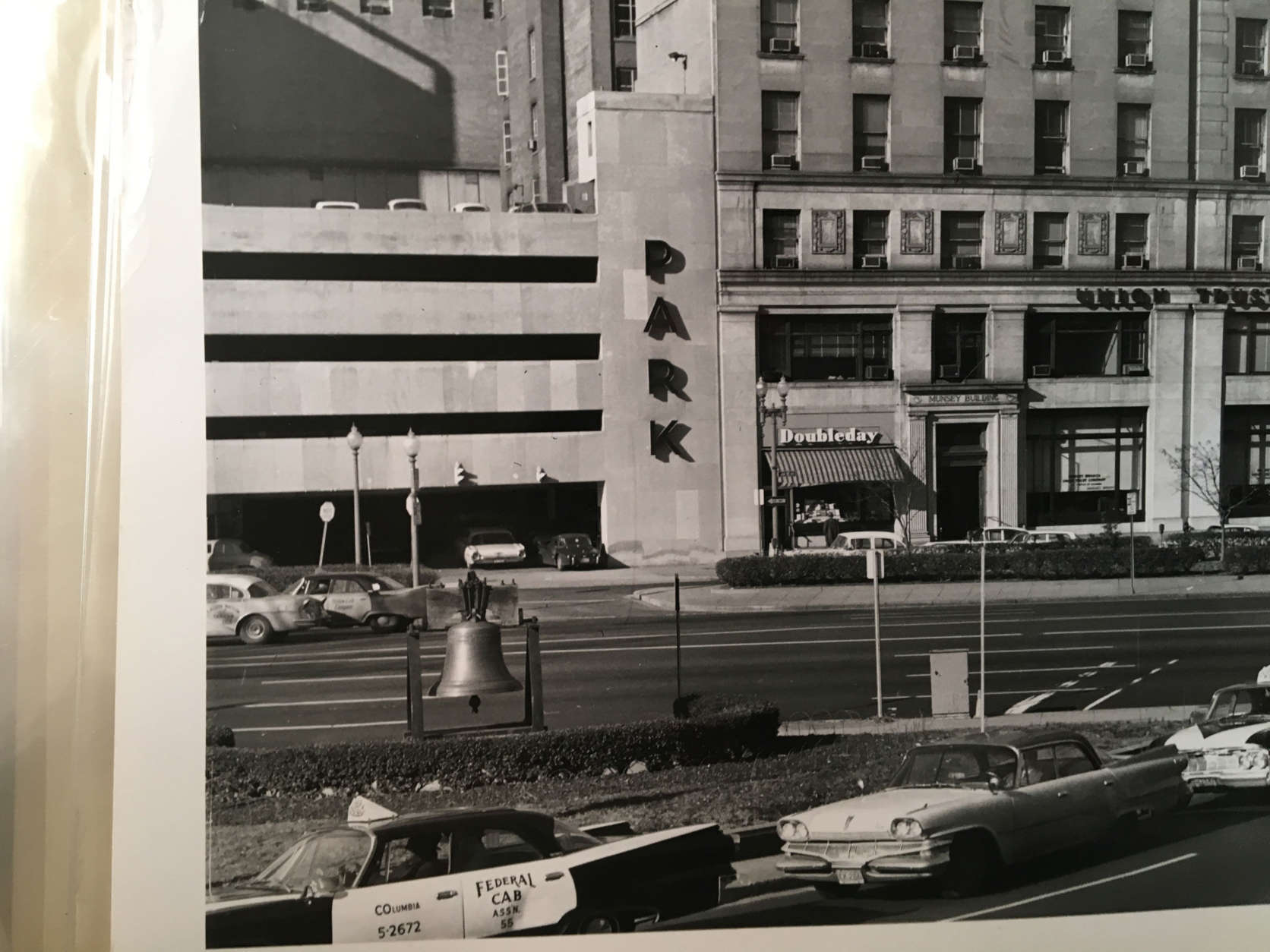 The bell was first put on the top of the steps of what is now the Wilson Building, and has moved to a triangular park in front of the building, Gibson said. (Courtesy D.C. Council)