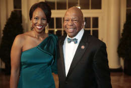 WASHINGTON, DC - FEBRUARY 11:  Representative Elijah Cummings, a Democrat from Maryland, right, and Maya Rockeymoore Cummings arrive to a state dinner hosted by U.S. President Barack Obama and U.S. first lady Michelle Obama in honor of French President Francois Hollande at the White House on February 11, 2014 in Washington, DC. Obama and Hollande said the U.S. and France are embarking on a new, elevated level of cooperation as they confront global security threats in Syria and Iran, deal with climate change and expand economic cooperation. (Photo by Andrew Harrer-Pool/Getty Images)