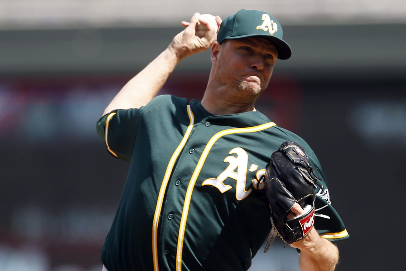 Oakland Athletics relief pitcher Ryan Madson throws against the Minnesota Twins in a baseball game Thursday, May 4, 2017, in Minneapolis. (AP Photo/Jim Mone)