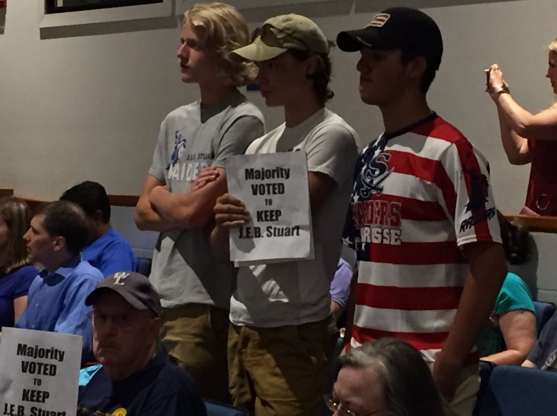 Supporters and opponents of a J.E.B. Stuart High School name change were sitting right next to each other. (WTOP/Michelle Basch)