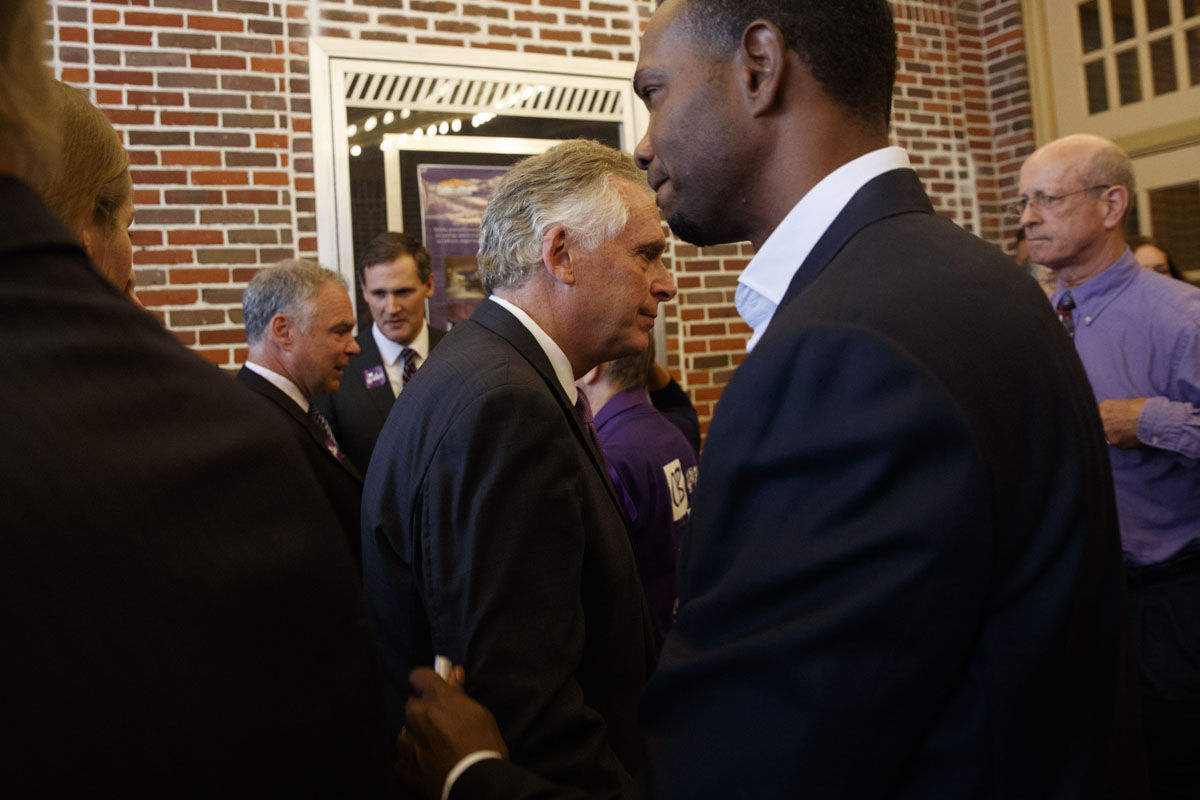 Virginia Gov. Terry McAuliffe walks into the Paramount Theatre in Charlottesville, Va., Wednesday, Aug. 16, 2017, after speaking with reporters outside a memorial service for Heather Heyer, who was killed during a white nationalist rally.   (AP Photo/Evan Vucci)