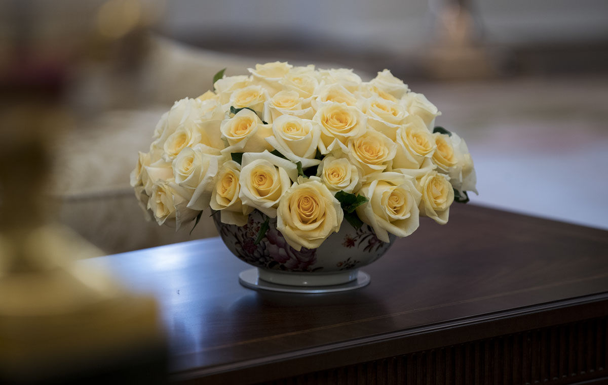 Yellow roses are seen on a table in the newly renovated Oval Office of the White House in Washington, Tuesday, Aug. 22, 2017, during a media tour. (AP Photo/Carolyn Kaster)