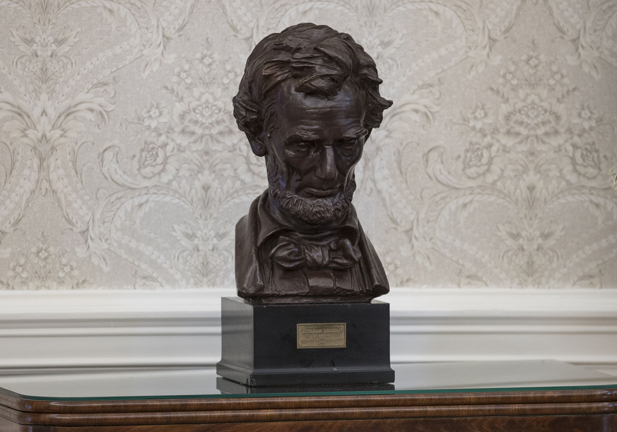 A bust of Abraham Lincoln is seen in the newly renovated Oval Office of the White House in Washington, Tuesday, Aug. 22, 2017, during a media tour. (AP Photo/Carolyn Kaster)