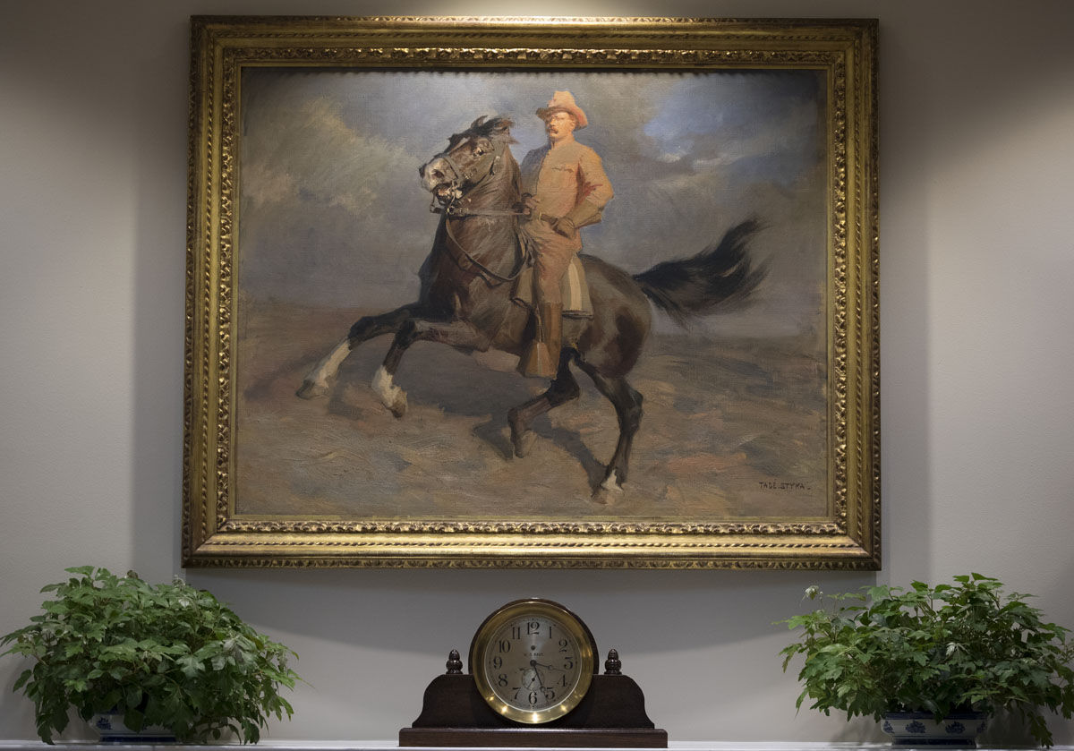 A portrait of Teddy Roosevelt "The Rough Rider" by TadÃ© (Thadeus) Styka is seen in the newly renovated Roosevelt Room of the White House in Washington, Tuesday, Aug. 22, 2017, during a media tour. (AP Photo/Carolyn Kaster)