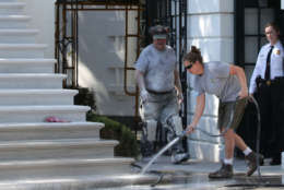 WASHINGTON, DC - AUGUST 22:  A member of the National Park Service washes the new South Portico steps of the White House August 22, 2017 in Washington, DC. The White House has undergone a major renovation with an upgrade of the HVAC system at the West Wing, the South Portico steps, the Navy mess kitchen, and the lower lobby.   (Photo by Alex Wong/Getty Images)