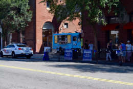 The food trucks are tucked away off the street. You'll also notice more wiggle-room for pedestrians in Georgetown on weekends. Temporary barriers claim part of M Street's curb lane to add pedestrian walkways. (Courtesy Bulldog Public Relations)