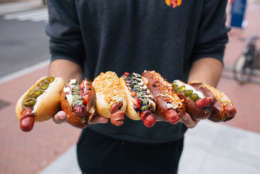 Gourmet hot dogs are the specialty of the Swizzler food truck. Its dogs include the Leonardo Dog Vinci with pesto, mozzarella and balsamic glaze, and the Buffalo Soldier, with blue cheese slaw and fried onion strings. (Courtesy Bulldog Public Relations)