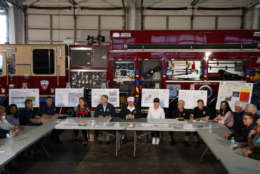 President Donald Trump, accompanied by, from left, center table, acting Homeland Security Secretary Elaine Duke, Texas Gov. Greg Abbott and first lady Melania Trump, participates in a briefing on Harvey relief efforts, Tuesday, Aug. 29, 2017, in Corpus Christi, Texas. (AP Photo/Evan Vucci)