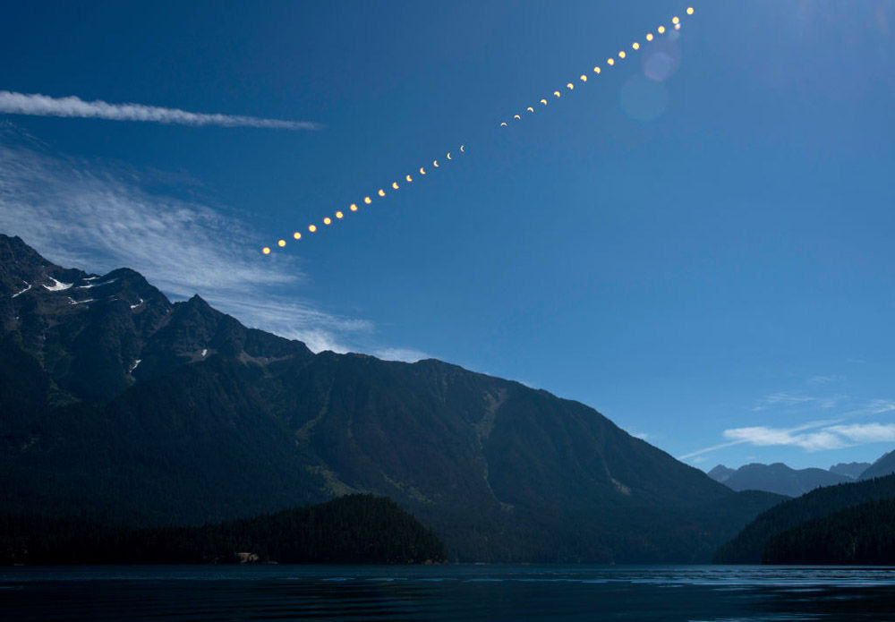 ROSS LAKE, WASHINGTON - AUGUST 21  (EDITORS NOTE: Multiple exposures were combined to produce this image.) In this NASA handout composite image,  the progression of a partial solar eclipse August 21, 2017 over Ross Lake, in Northern Cascades National Park, Washington. A total solar eclipse swept across a narrow portion of the contiguous United States from Lincoln Beach, Oregon to Charleston, South Carolina. A partial solar eclipse was visible across the entire North American continent along with parts of South America, Africa, and Europe.   (Photo by Bill Ingalls/NASA via Getty Images)