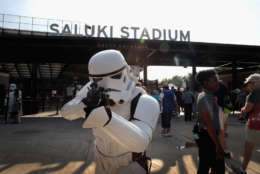 CARBONDALE, IL - AUGUST 21:  A person dressed as a Star Wars Stormtrooper poses as people arrive at Saluki Stadium on the campus of Southern Illinois University to watch the solar eclipse on August 21, 2017 in Carbondale, Illinois. With approximately 2 minutes 40 seconds of totality the area in Southern Illinois will experience the longest duration of totality during the eclipse. Millions of people are expected to watch as the eclipse cuts a path of totality 70 miles wide across the United States from Oregon to South Carolina on August 21.  (Photo by Scott Olson/Getty Images)