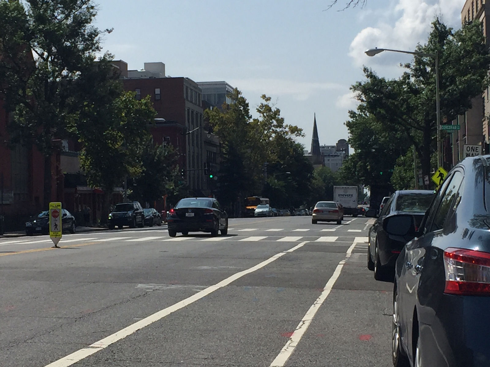 The intersection of the 1400 block of Corcoran Street NW in D.C. An armed robbery happened near here in broad daylight last week, despite that residents say they feel safe in the neighborhood. (WTOP/Dennis Foley)