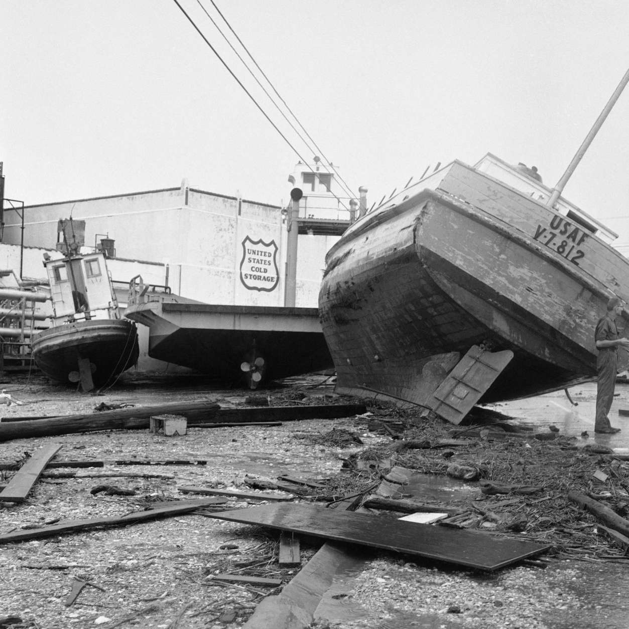 Tugboats, barges and fishing vessels litter the waterfront at Port Lavaca, Texas on Sept. 12, 1961 after hurricane Carla passed through during the night. Damage in the waterfront area of this coastal city was heavy. (AP Photo/Ted Powers)