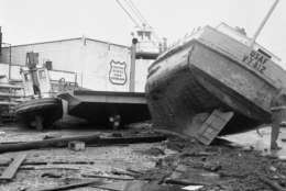 Tugboats, barges and fishing vessels litter the waterfront at Port Lavaca, Texas on Sept. 12, 1961 after hurricane Carla passed through during the night. Damage in the waterfront area of this coastal city was heavy. (AP Photo/Ted Powers)