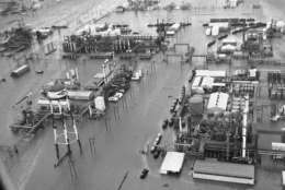 An aerial view of a portion of Dow Chemical Companys huge chemical plant at Freeport, Texas on Sept. 12, 1961. High tides, heavy rains and a break in the river levee inundated much of the city as hurricane Carla hit the Texas coast. (AP Photo/Ferd Kaufman)