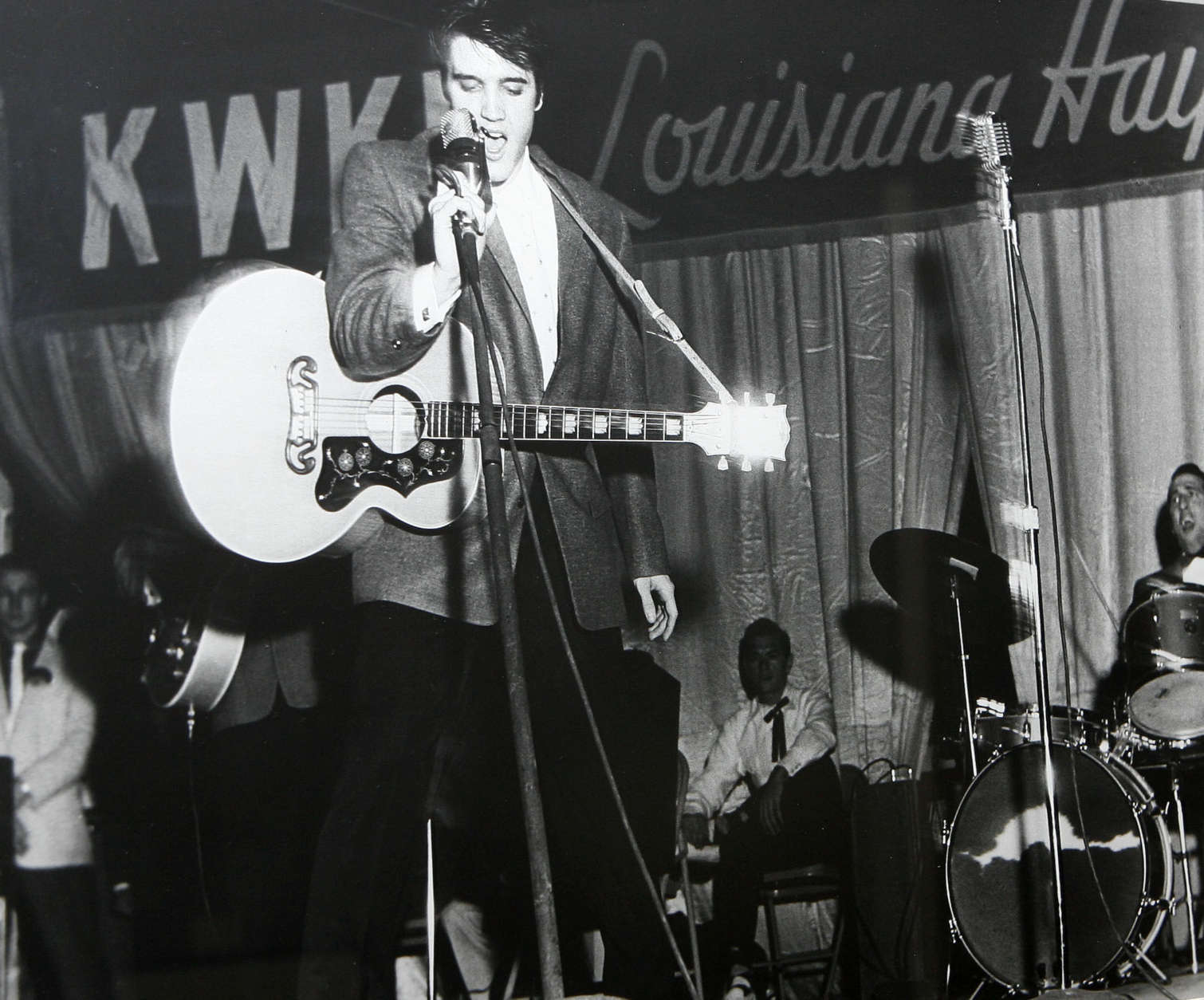 A new exhibit is going up at Masur Museum in Monroe, La., features photographs of a young Elvis Presley on the stage of the Louisiana Hayride in Shreveport, La.  The show focuses on 40 black and white photographs taken by Shreveport photojournalists Jack Barham and Langston McEachern, most depicting Elvis in his final performance in Shreveport on Dec. 15, 1956. (AP Photo,file)