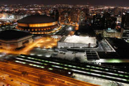 The Louisiana Superdome and New Orleans skyline are seen from the air at night,  Saturday, July 31, 2010. (AP Photo/Gerald Herbert)