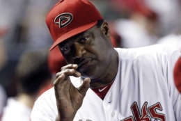 Don Baylor, former major league baseball player, manager and coach, died Monday after a long battle with cancer. He was 68. In this Aug. 12, 2011, file photo, Arizona Diamondbacks' batting coach Don Baylor gestures during a baseball game against the New York Mets, in Phoenix. (AP Photo/Ross D. Franklin, File)