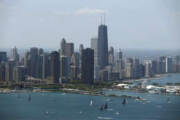 Sailboats practice in front of the downtown Chicago skyline, Friday, June 10, 2016, during practice for an America's Cup World Series sailing event, which will be held Saturday and Sunday. (AP Photo/Kiichiro Sato)