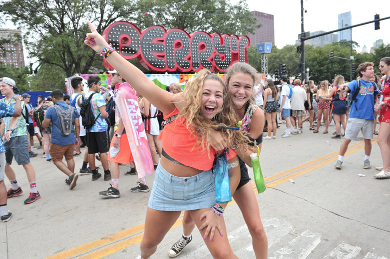 Concertgoers on day two at Lollapalooza in Grant Park on Friday, Aug 4, 2017 in Chicago. (Photo by Rob Grabowski/Invision/AP)