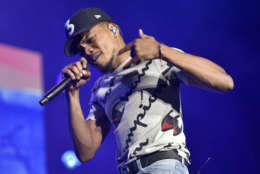 Chance The Rapper performs on day three at Lollapalooza in Grant Park on Saturday, Aug 5, 2017 in Chicago. (Photo by Rob Grabowski/Invision/AP)