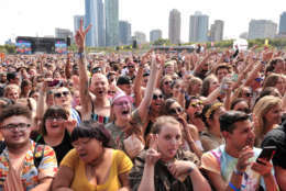 Concertgoers on day four at Lollapalooza in Grant Park on Sunday, Aug 6, 2017 in Chicago. (Photo by Rob Grabowski/Invision/AP)