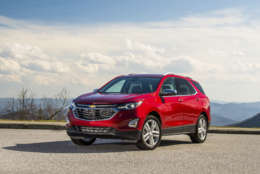 This photo provided by General Motors Co. shows the 2018 Chevrolet Equinox, an example of a vehicle that has features parents will love. One feature in particular is the installation of multiple USB charging ports, which give all passengers the ability to charge mobile devices while traveling. (Jessica Lynn Walker/Courtesy of General Motors Co. via AP)