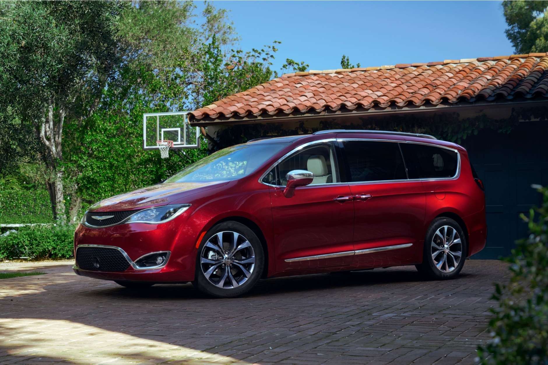 This photo provided by Fiat Chrysler shows the 2017 Chrysler Pacifica, an example of a vehicle that has features parents will love. One feature in particular is the built-in vacuum cleaner that makes cleaning up the interior a snap no matter where the mess is left. (Webb Bland/Courtesy of Fiat Chrysler Automobiles North America LLC via AP)