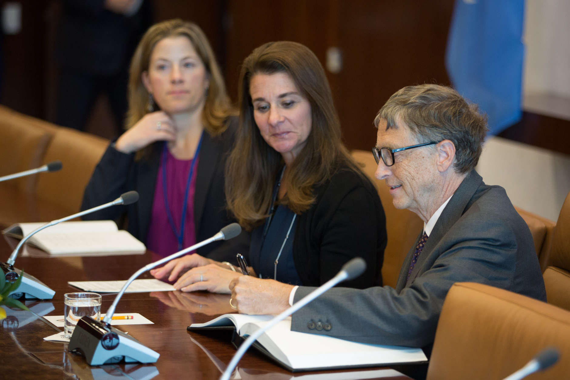 Melinda Gates, center, and Bill Gates, right, sign in during their meeting with Secretary-General Ban Ki-moon at the United Nations headquarters Friday, Sept. 25, 2015. The United Nations is conducting the Sustainable Development Summit with the goal of adopting of a post-2015 development agenda. (AP Photo/Kevin Hagen)