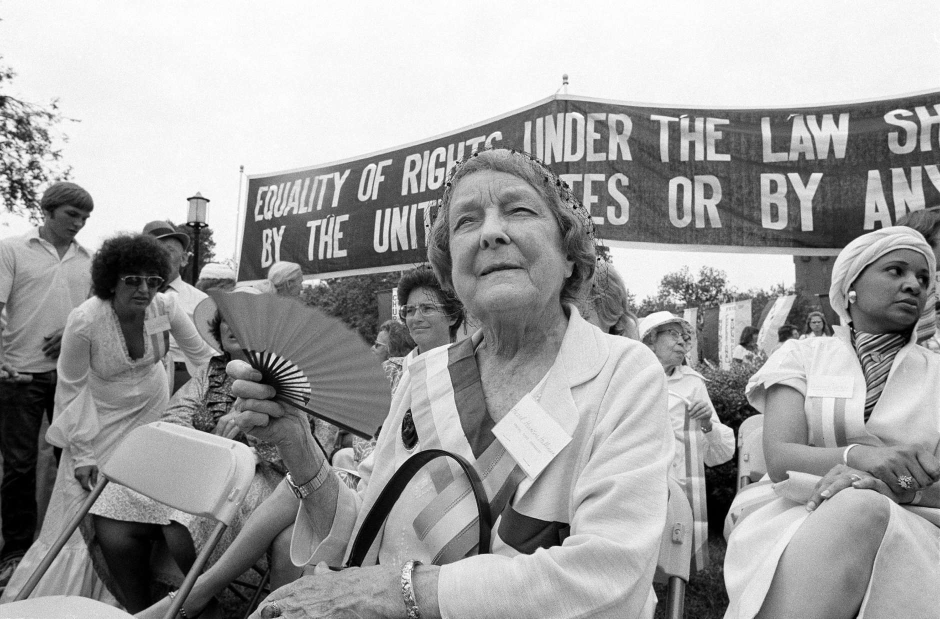 Hazel Hunkines Hallinnan, one of the original suffragist, fans herself after marching with supports of the Equal Rights Amendment down Pennsylvania Avenue in Washington on August 26, 1977. Thousands of women participated in the march which coincided with the 57th anniversary of womens suffrage. (AP Photo)