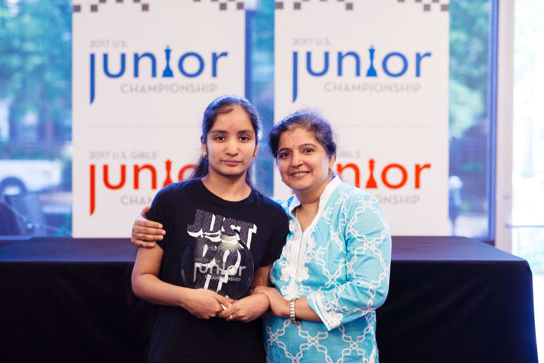 Akshita Gorti poses with her first place trophy alongside her mother. (Austin Fuller/Chess Club and Scholastic Center of St. Louis)