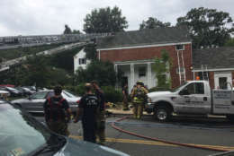 Firefighters battling a blaze on Valley Drive in Alexandria, Virginia. (WTOP/Mike Murillo)
