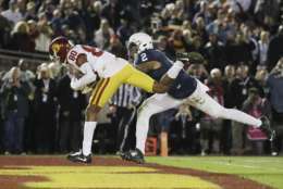 USC Trojans wide receiver Deontay Burnett (80) catches a game-tying touchdown pass over Penn State Nittany Lions safety Marcus Allen (2) during the Rose Bowl NCAA college football game, Monday, Jan. 2, 2017 in Pasadena, Calif. USC defeated Penn State 52-49 on a last second field goal. (AP Photo/Doug Benc)