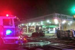 One person is dead and another seriously injured after a fiery crash at a Northeast D.C. gas station early Saturday morning. (Courtesy DC Fire and EMS)