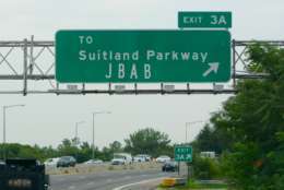 The Interstate 295 and Suitland Parkway junction is a partial cloverleaf interchange, consisting of three ramp loops in its four quadrants. The northbound exit to Suitland Parkway is numbered Exit 3. Okay, so the font used in the sign isn't up to the the Manual on Uniform Traffic Control Device's standards – we'll let that slide. Otherwise the sign seems pretty straightforward, except... (WTOP/Dave Dildine)