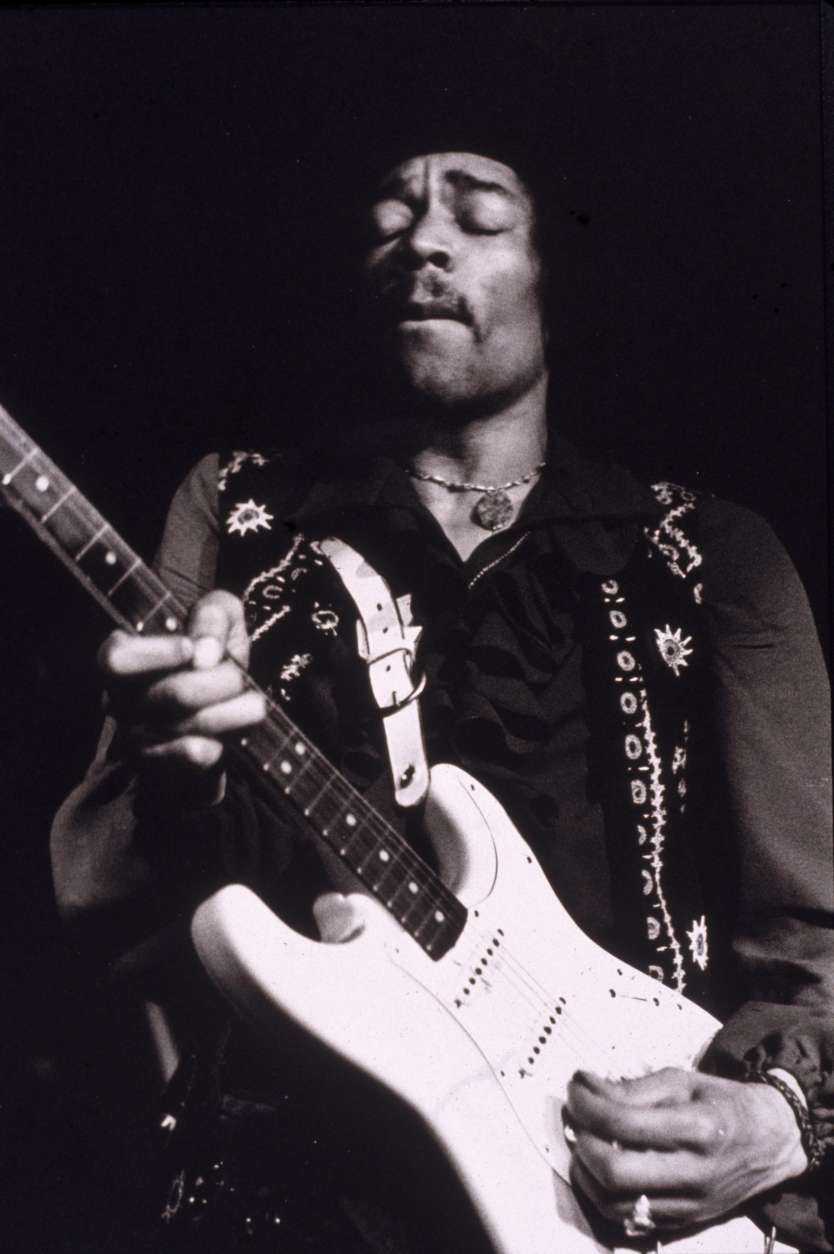 American musician Jimi Hendrix (1942 - 1970) performs onstage, late 1960s. (Hulton Archive/Getty Images)