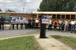 State highway officials, law enforcement authorities, road safety advocates and schoolkids joined together Wednesday for the back-to-school safety reminder. (WTOP/Dick Uliano)