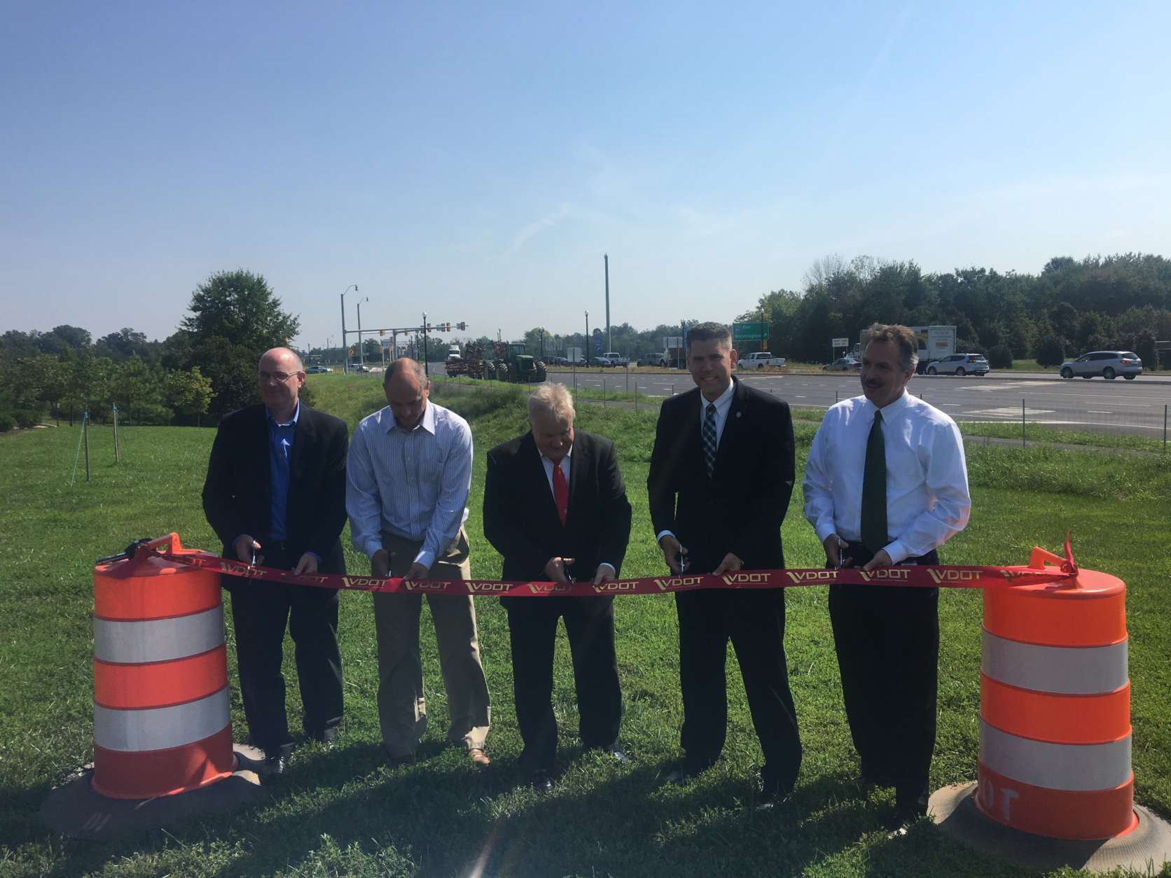 Officials cut the ribbon at the opening of the diverging diamond interchange at U.S. 15 and Interstate 66 in Haymarket. (Courtesy Virginia Department of Transportation)