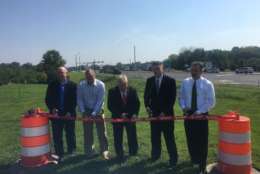 Officials cut the ribbon at the opening of the diverging diamond interchange at U.S. 15 and Interstate 66 in Haymarket. (Courtesy Virginia Department of Transportation)