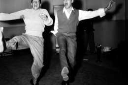Comedy duo Dean Martin, left, and Jerry Lewis rehearse at the Nola Studios in New York City for their opening at the Copacabana, Jan. 20, 1954.  (AP Photo/Dan Grossi)